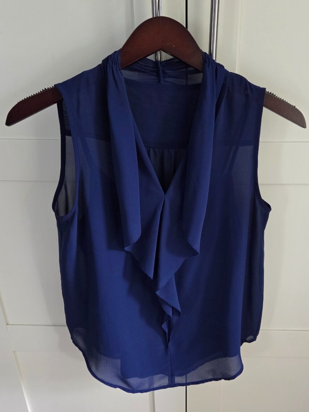 Top or Camisole sleeveless with picot edge detail on collar